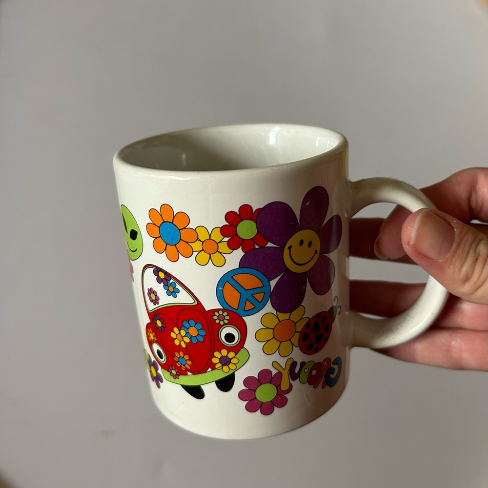 Colorful printed smiley hippy mug